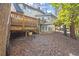 Expansive wooden deck overlooks the private, wooded backyard, perfect for outdoor entertaining at 160 Wing Mill Rd, Sandy Springs, GA 30350