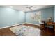 Bedroom featuring a ceiling fan, hard wood floors, and light blue walls at 160 Wing Mill Rd, Sandy Springs, GA 30350