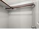 Walk-in closet with white walls and a copper colored clothes bar at 160 Wing Mill Rd, Sandy Springs, GA 30350
