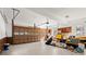 Spacious garage with a large garage door and ample storage space for vehicles and equipment at 160 Wing Mill Rd, Sandy Springs, GA 30350