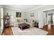 Comfortable living room with a large sectional sofa and neutral decor at 160 Wing Mill Rd, Sandy Springs, GA 30350