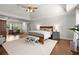 Spacious main bedroom with hard wood floors and natural light; includes sitting area and private bath at 160 Wing Mill Rd, Sandy Springs, GA 30350