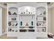 Custom built-in shelving unit featuring shelving and lower cabinets at 1811 Mcconnell Rd, Grayson, GA 30017