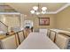 Elegant dining room with stylish chairs, chandelier, and access to the living room at 1811 Mcconnell Rd, Grayson, GA 30017