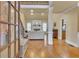 Spacious foyer with hardwood floors, open to the living room and staircase at 1811 Mcconnell Rd, Grayson, GA 30017