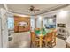 Open concept kitchen with wood cabinets, stainless steel appliances, and dining table at 1811 Mcconnell Rd, Grayson, GA 30017