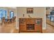 Stylish cabinet near the dining area perfect for storing wine and glasses at 1811 Mcconnell Rd, Grayson, GA 30017