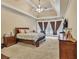 Spacious main bedroom with tray ceiling, bay window, and large carpeted area at 1811 Mcconnell Rd, Grayson, GA 30017