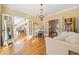 Open-concept living room with hardwood floors, ample space for furniture, and access to other rooms at 217 Colonial Dr, Woodstock, GA 30189