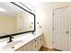 Bathroom featuring double sinks, framed mirror and stylish fixtures for a modern and functional design at 386 Creek Manor Way, Suwanee, GA 30024