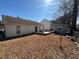 Spacious backyard with a cozy patio area, perfect for outdoor entertaining and relaxation at 6163 Princeton Ave, Morrow, GA 30260