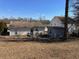 Expansive backyard with mature trees, offering privacy and a peaceful setting at 6163 Princeton Ave, Morrow, GA 30260