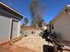 A backyard includes an outdoor patio with furniture next to a shed at 6163 Princeton Ave, Morrow, GA 30260
