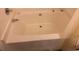 An angled white bathtub at 6163 Princeton Ave, Morrow, GA 30260