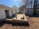 Back patio with furniture and a small shed at 6163 Princeton Ave, Morrow, GA 30260