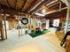 Unfinished basement offering potential for customization, showcasing exposed beams and ample open space at 6302 Manassas Nw Pass, Acworth, GA 30101