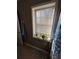 The bathroom features a window with plants and a curtain at 184 Cedarcrest Dr, Acworth, GA 30101