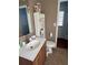 Cozy bathroom featuring a vanity with sink, toilet, and storage, perfect for your daily routines at 184 Cedarcrest Dr, Acworth, GA 30101