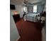 Well-lit bedroom featuring neutral walls, ceiling fan, and a cozy bed, providing relaxation at 184 Cedarcrest Dr, Acworth, GA 30101