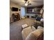 Cozy bedroom featuring carpet, a ceiling fan and modern decor at 184 Cedarcrest Dr, Acworth, GA 30101