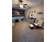 A cozy bedroom featuring a glider, dresser, and bed with charming wall accents at 184 Cedarcrest Dr, Acworth, GA 30101
