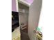 A closet in the bedroom with clothes, boxes and storage for organized living at 184 Cedarcrest Dr, Acworth, GA 30101