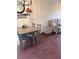Dining area with hardwood floors and neutral color walls sits next to the living room at 184 Cedarcrest Dr, Acworth, GA 30101
