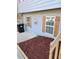 Side view of home showing mulched landscaping, siding, and wood shutters that add rustic charm at 184 Cedarcrest Dr, Acworth, GA 30101