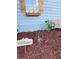 Close-up of the yard featuring charming welcome sign, mulch landscaping, hose and classic bench at 184 Cedarcrest Dr, Acworth, GA 30101