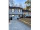 Inviting two-story home with blue siding and decorative wood shutters, showcasing its well-maintained landscape and curb appeal at 184 Cedarcrest Dr, Acworth, GA 30101