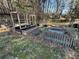 Backyard area featuring raised garden beds with custom wood and metal fencing at 184 Cedarcrest Dr, Acworth, GA 30101