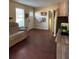 Open-concept living room with hardwood floors and natural light at 184 Cedarcrest Dr, Acworth, GA 30101
