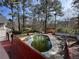 In-ground backyard pool with lounge chairs and a gazebo perfect for summer relaxation at 98 Pace Dr, Hiram, GA 30141
