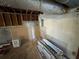 Unfinished basement area with exposed pipes and concrete walls, offering potential for customization and additional space at 98 Pace Dr, Hiram, GA 30141