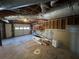 Unfinished basement with an overhead garage door offering renovation potential at 98 Pace Dr, Hiram, GA 30141
