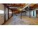Large unfinished basement with exposed ceiling offers potential for customization at 98 Pace Dr, Hiram, GA 30141