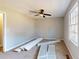 Bedroom featuring carpet, neutral walls, and a large window for natural light at 98 Pace Dr, Hiram, GA 30141