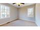 Bedroom featuring two windows and a ceiling fan at 98 Pace Dr, Hiram, GA 30141