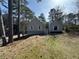 View of the home with gray siding, shutters, and manicured front yard at 98 Pace Dr, Hiram, GA 30141
