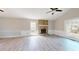 Inviting living room with a stone fireplace, vaulted ceiling, and large windows at 98 Pace Dr, Hiram, GA 30141