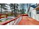 Expansive wooden deck overlooking the pool, ideal for outdoor entertaining and relaxation in a private setting at 98 Pace Dr, Hiram, GA 30141