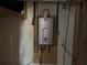 Image of an energy-efficient tankless water heater installed in the basement at 98 Pace Dr, Hiram, GA 30141