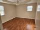 Cozy bedroom with wood floors and natural light, ready for relaxation and peaceful nights at 1619 Flowery Branch Rd, Auburn, GA 30011