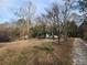 Charming home nestled in a wooded area, surrounded by mature trees offering privacy at 1619 Flowery Branch Rd, Auburn, GA 30011
