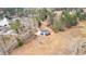 Aerial view of this lovely home with wooded lot, lake, and pergola at 260 Sandy Lake Cir, Fayetteville, GA 30214