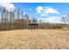 Large backyard featuring a gazebo and swing set, perfect for outdoor activities at 260 Sandy Lake Cir, Fayetteville, GA 30214