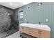 Modern bathroom with double sink vanity, sleek lighting, and a luxe marble shower at 260 Sandy Lake Cir, Fayetteville, GA 30214