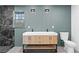 Modern bathroom with double sink vanity, sleek lighting, and a luxe marble shower at 260 Sandy Lake Cir, Fayetteville, GA 30214