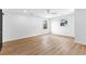 Large bedroom with new flooring, white walls, and bright windows at 260 Sandy Lake Cir, Fayetteville, GA 30214