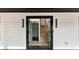Front entryway shows the staircase, coatrack, and neutral color palette at 260 Sandy Lake Cir, Fayetteville, GA 30214